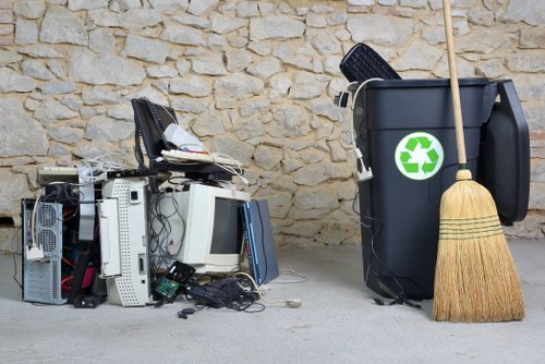 Workers wearing PPE during a waste removal operation