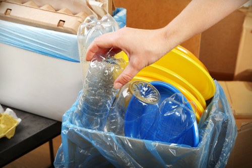 Team members sorting items during loft clearance